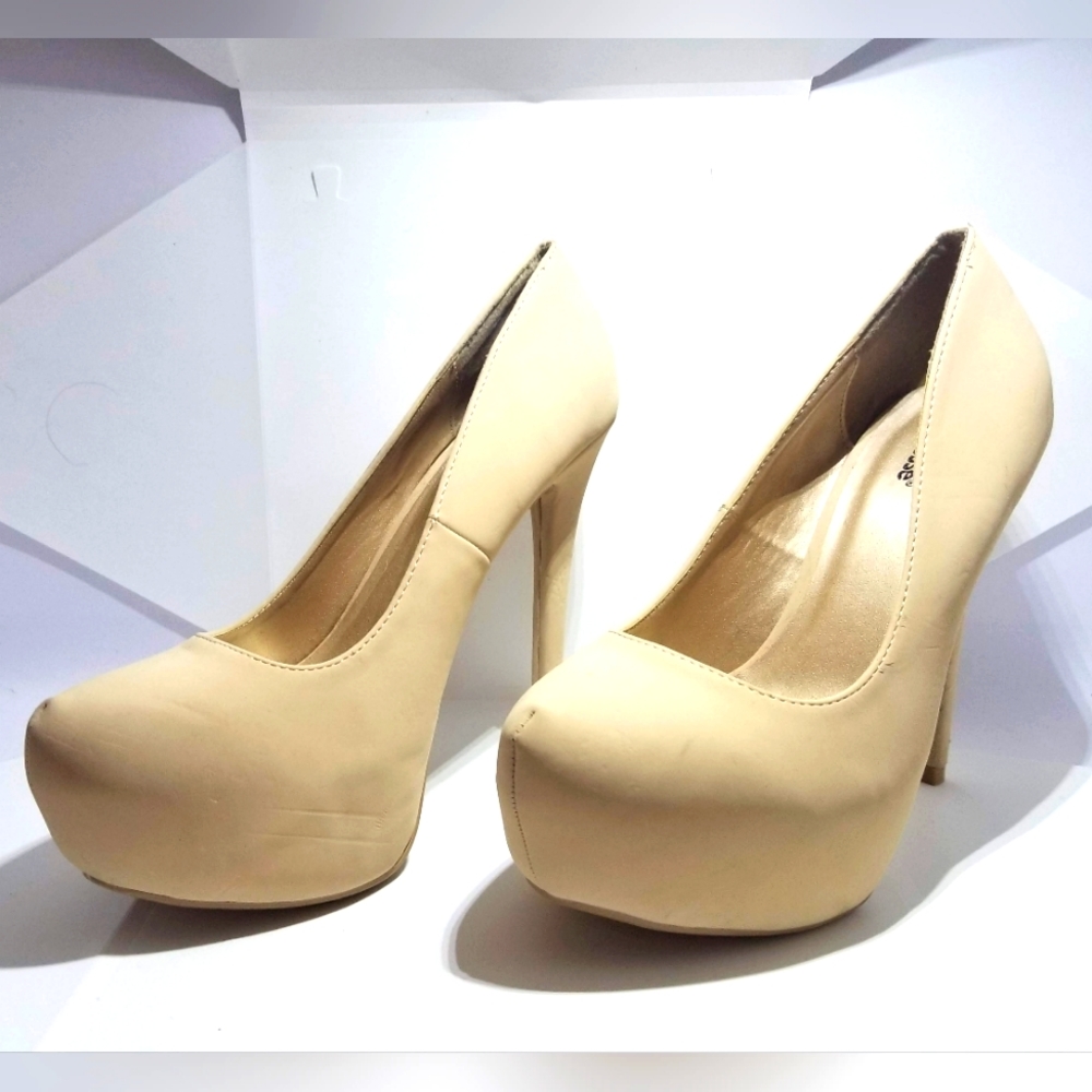 High-heel shoes cream colored,go with anything.